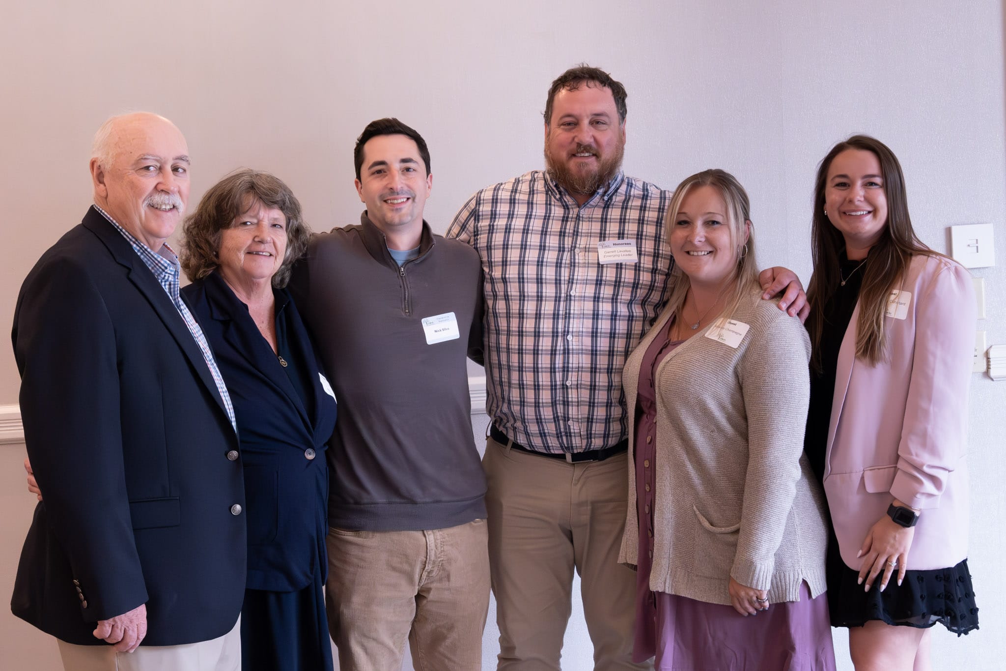 Spaulding staff Gary, Mary, Nick, Garrett, Amanda and Courtney pose for photo